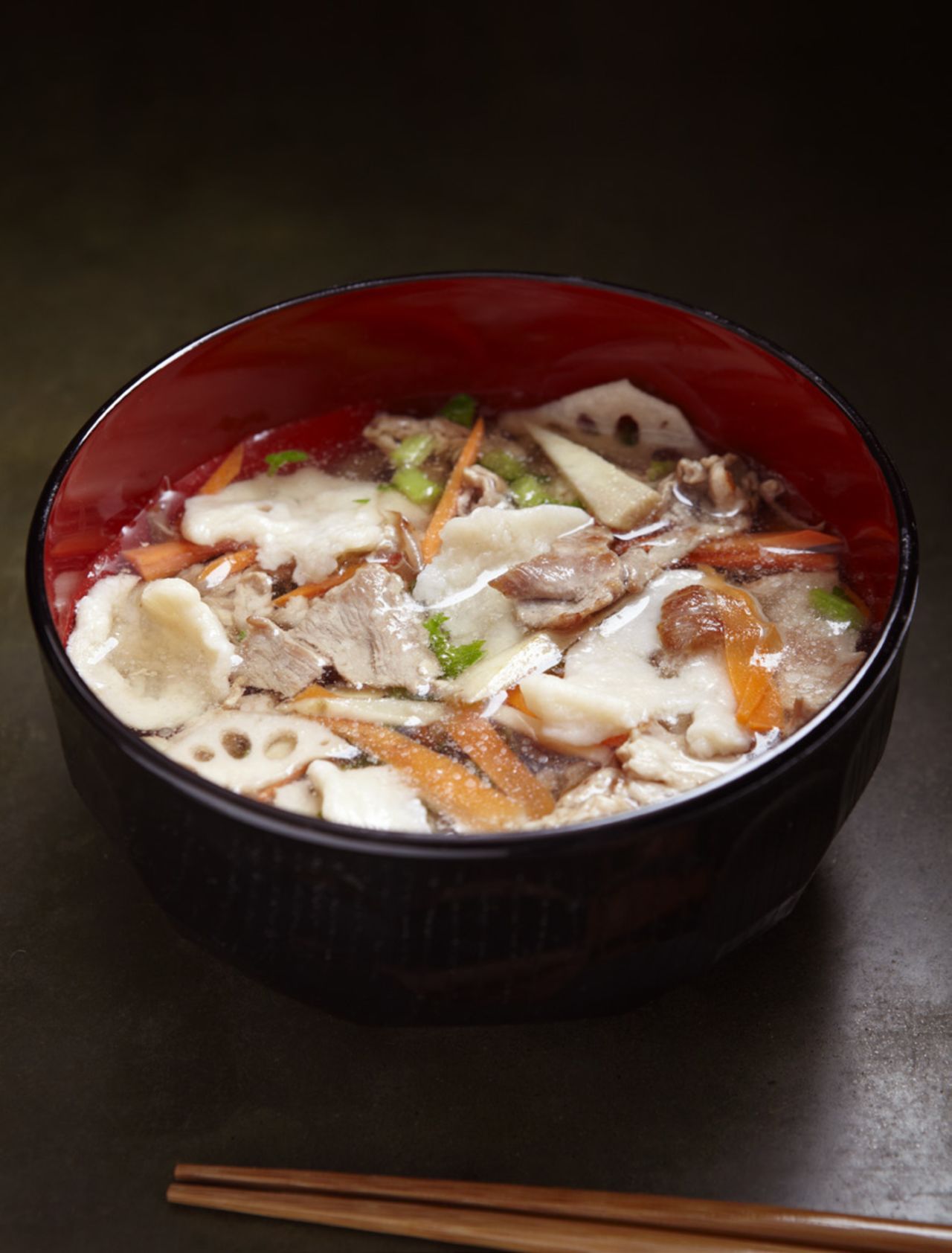 Pinched noodle soup with pork is a classic Tohoku comfort food. In local Iwate dialect, the word hittsumi means "to pinch" and describes how the noodles are made. 