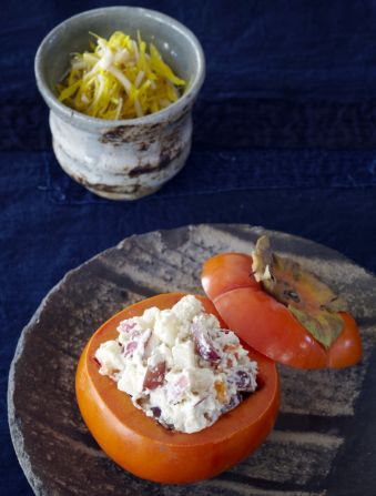 The diced persimmon is served on its own or in combination with other fall fruits -- grapes, pears, crisp apples -- that have been covered with a classic sauce of pine nuts and tofu called shira ae.