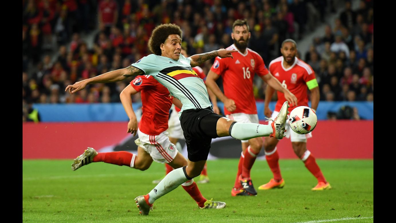 Belgian midfielder Axel Witsel stretches for the ball.