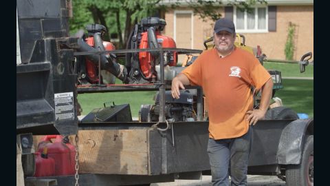 Alfredo Gamez sends home money he earns from his landscaping business.