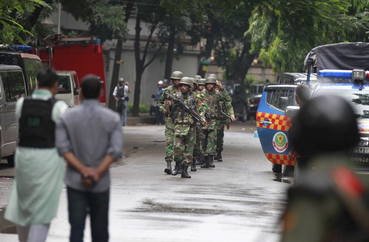 The military says the attackers used guns, explosive devices and "a lot of sharp domestic weapons." The hostages' bodies were found after the standoff ended on Saturday.  