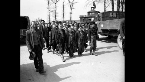 Children and other prisoners liberated by the U.S. Army leave Buchenwald concentration camp near Weimar, Germany, in April 1945. The tall youth in the line at left, fourth from the front, is Elie Wiesel, who died Saturday, July 2, 2016, at age 87.