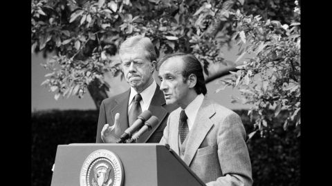 Then-President Jimmy Carter stands by as Elie Weisel speaks in the White House Rose Garden on September 28, 1979. Wiesel, a Nobel Peace Prize laureate and acclaimed writer, died July 2, 2016, at age 87.