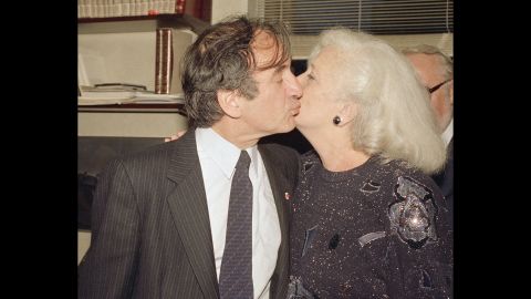 Author and Nazi death camp survivor Elie Wiesel kisses his wife, Marion, as they greet the press in their apartment in New York on October 14, 1986, after it was announced that Wiesel was awarded the Nobel Peace Prize. Wiesel, who wrote extensively about his experiences during the Holocaust, died July 2, 2016, at age 87.