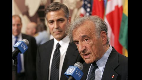 Nobel Peace Prize laureate Elie Wiesel, right, and actor George Clooney respond to questions after addressing the Security Council at the United Nations in New York on September 14, 2006. Wiesel died July 2, 2016, at age 87.