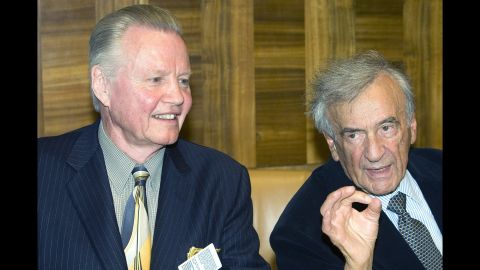 Nobel laureate Elie Wiesel, right, and actor Jon Voight, left, wait for the beginning of a conference on "Lessons of the Holocaust for Antisemitism and Intolerance in the 21st Century" at the United Nations office in Geneva, Switzerland, in 2009.