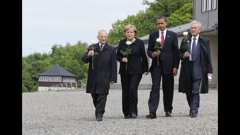 Buchenwald survivors Elie Wiesel, right, and Bertrand Hertz, left, walk with German Chancellor Angela Merkel and U.S. President Barack Obama at the Buchenwald camp near Weimar, Germany, on  June 5, 2009. Wiesel, 87, died on July 2, 2016.