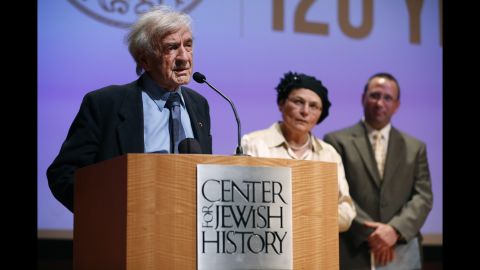 Elie Wiesel addresses the audience before presenting the Emma Lazarus Statue of Liberty Award to Avital Sharansky, center, at the Center for Jewish History on May 28, 2013, in New York. 