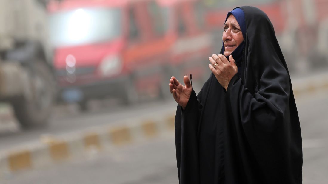An Iraqi woman grieves at the scene of the Karrada blast on July 3. A second bomb exploded Sunday at an outdoor market in the Shaab neighborhood of southeastern Baghdad, killing one person and wounding five others, police said. Both Baghdad strikes are a sign of the Sunni-Shiite tension in the Muslim world. Sunni-dominated ISIS claimed it was targeting Shiite neighborhoods.