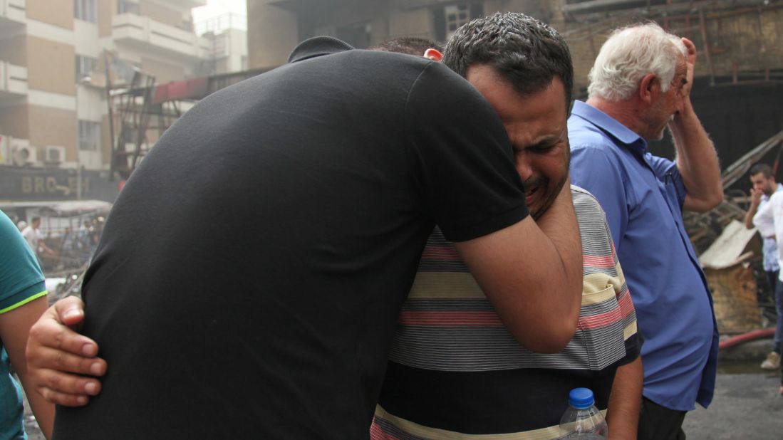 People who lost their relatives mourn after the bombing.