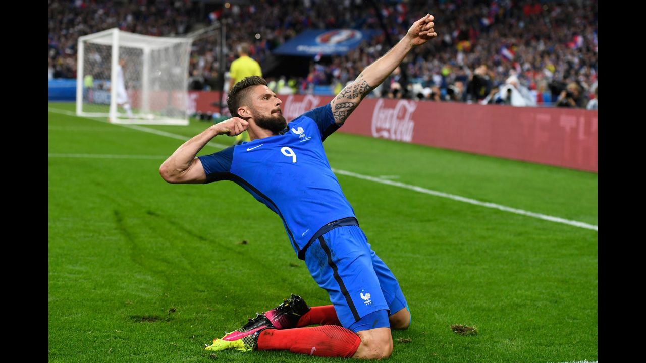 Olivier Giroud of France celebrates scoring his team's fifth goal during quarterfinal match between France and Iceland on Sunday, July 3, in Paris.