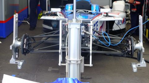 A stripped down Formula E car being prepared for Sunday's race. 