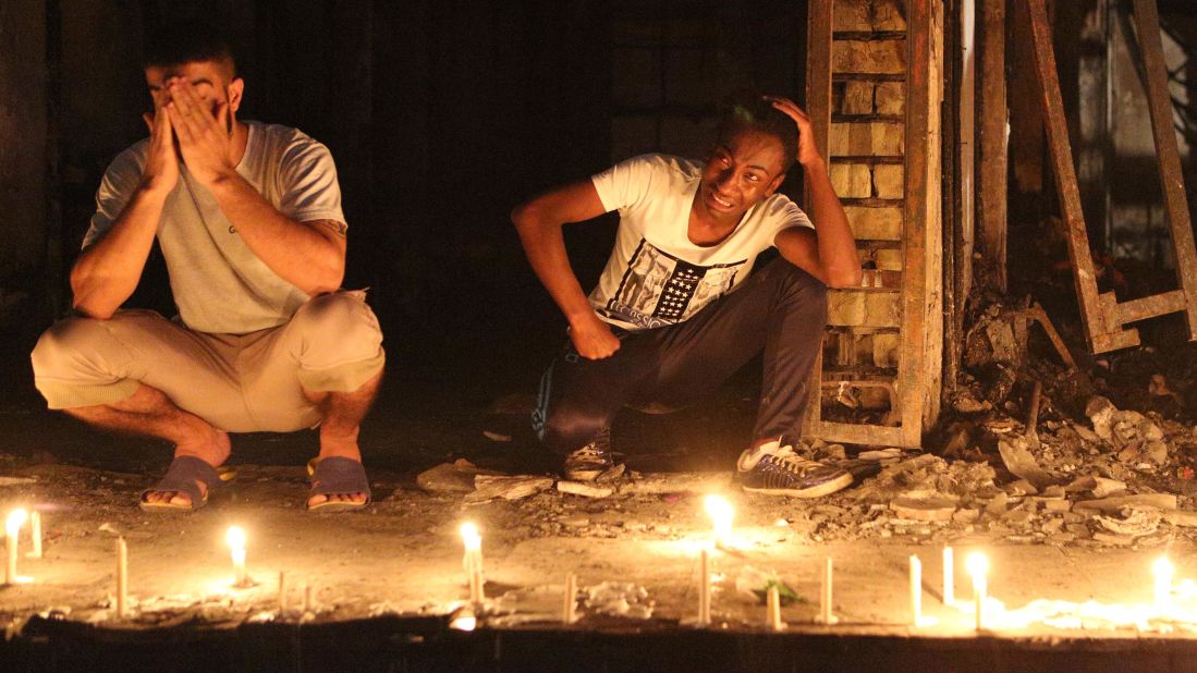People light candles at the scene of the Karrada bombing. 