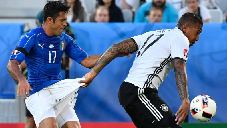 German defender Jerome Boateng grabs the shorts of Italian forward Eder during a Euro 2016 quarterfinal match on Saturday, July 2. <a href="index.php?page=&url=http%3A%2F%2Fwww.cnn.com%2F2016%2F07%2F02%2Ffootball%2Fgermany-italy-euro-2016%2F" target="_blank">Germany advanced</a> after a dramatic penalty shootout.