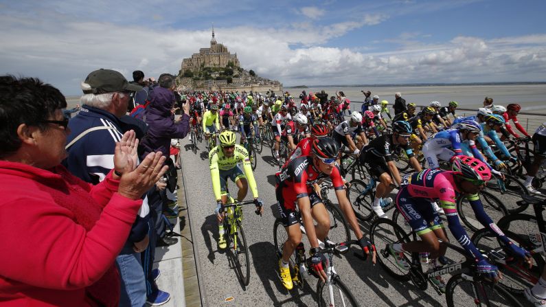 Cyclists begin the first stage of the Tour de France on Saturday, July 2. The starting point was Mont Saint-Michel, an island in Normandy, France.