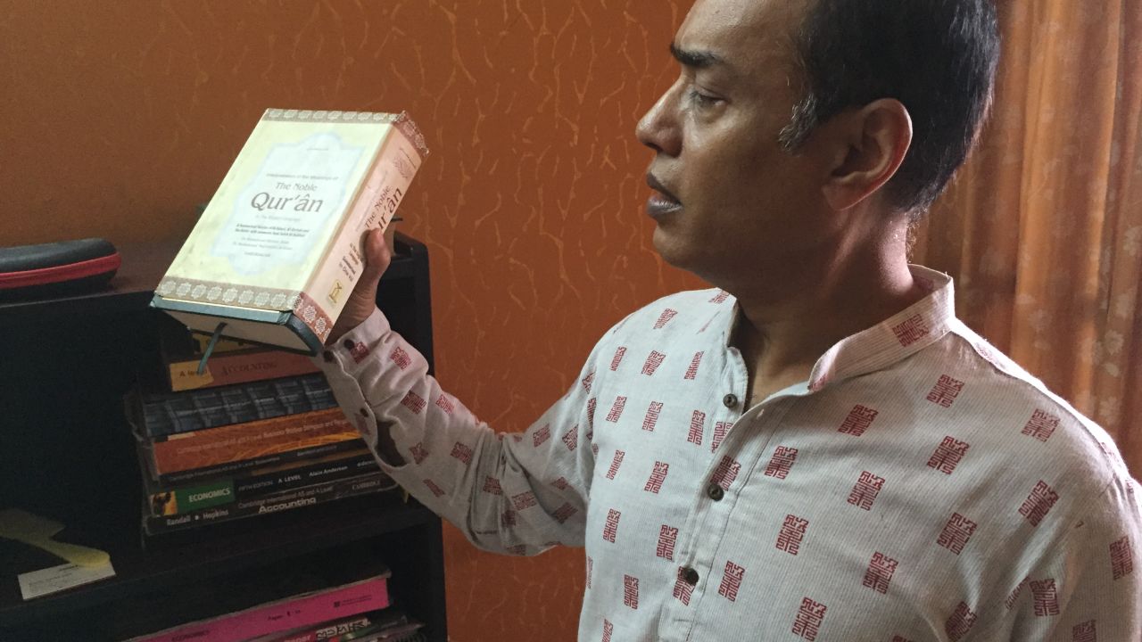Meer Hayet Kabir gave his son an English version of the Quran so he wouldn't get a warped view of Islam.