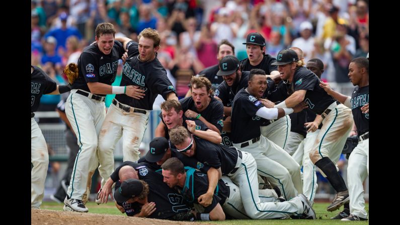 Coastal Carolina players celebrate after winning the College World Series on Thursday, June 30. The Chanticleers defeated Arizona to claim their first-ever national title.