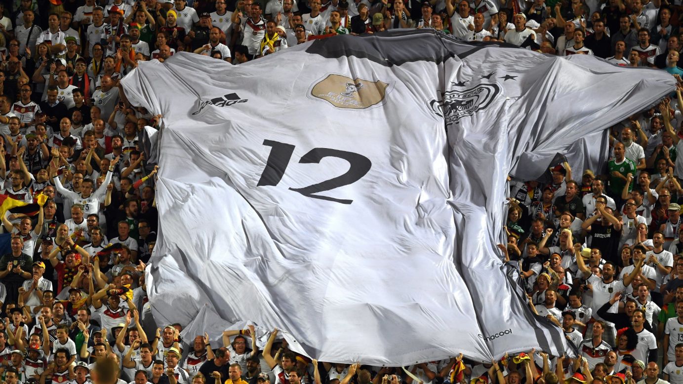 Germany fans display a giant jersey in the stands during a Euro 2016 quarterfinal match in Bordeaux, France, on Saturday, July 2.