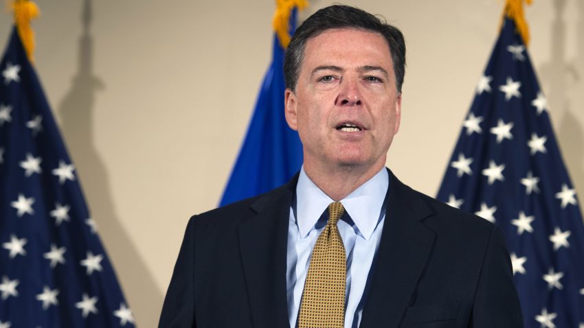 FBI Director James Comey makes a statement at FBI Headquarters in Washington, Tuesday, July 5, saying 110 emails sent or received on Hillary Clinton's server contained classified information.