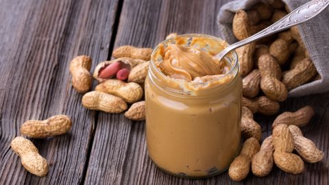 Peanut butter fans, rejoice! Peanuts are a great source of monounsaturated fat, but watch out for sugar! Try to stick to natural versions, and watch your portions. Like all nuts, peanuts are high in calories.