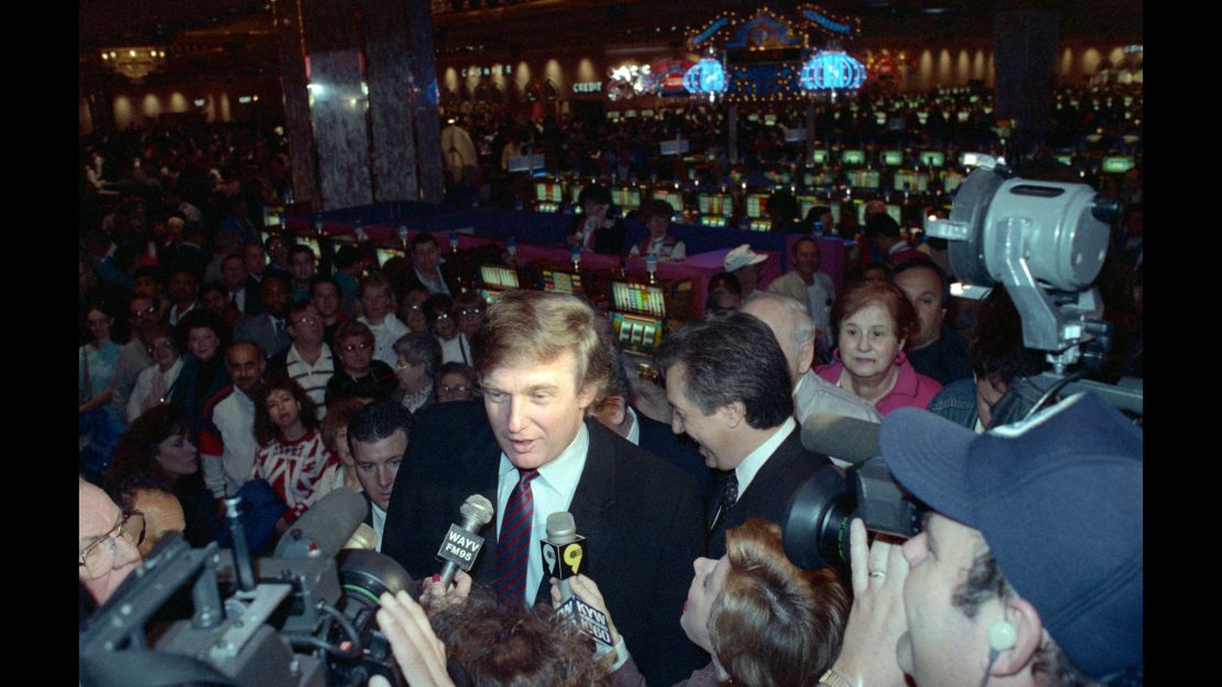 Trump in front of slot machines at the Taj