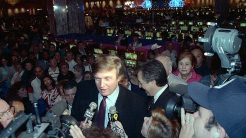 Trump in front of slot machines at the Taj