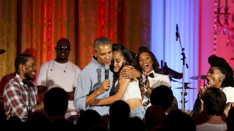 Obama hugs Malia at the White House Fourth of July party in 2016. She was <a href="index.php?page=&url=http%3A%2F%2Fwww.cnn.com%2F2016%2F07%2F05%2Fpolitics%2Fobama-malia-birthday-singing%2F">celebrating her 18th birthday</a> during the party, which included musicians Janelle Monae and Kendrick Lamar. 