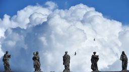Heavy clouds are seen above statues of the Vatican before the Angelus prayer of Epiphany's day on January 6, 2016.   AFP PHOTO / GABRIEL BOUYS / AFP / GABRIEL BOUYS        (Photo credit should read GABRIEL BOUYS/AFP/Getty Images)