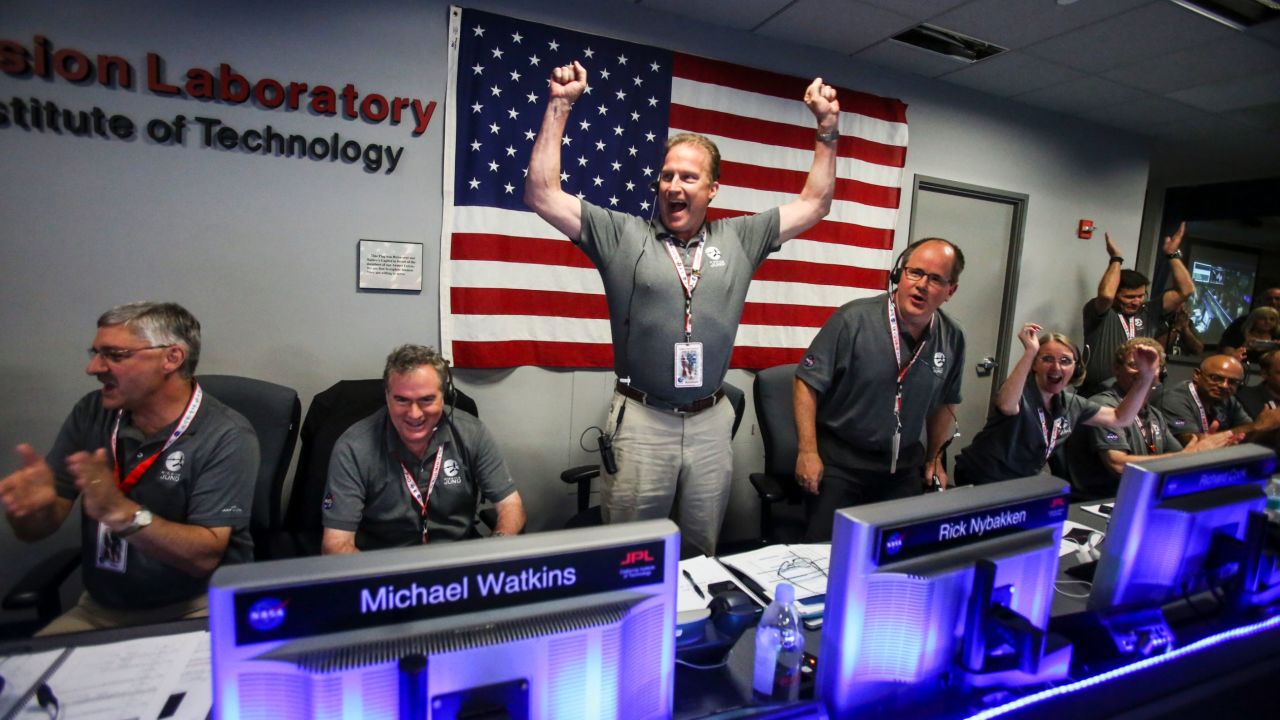 The Juno team celebrates at Mission Control at NASA's Jet Propulsion Laboratory in Pasadena, California.
