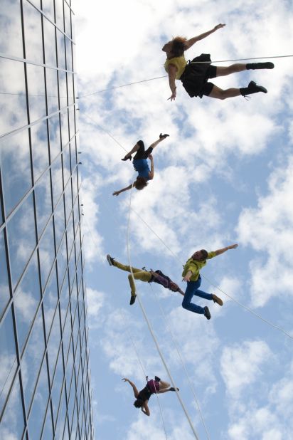 "Hanging from a building that's over 400 feet tall is, first of all, just scary. In addition, one has to deal with wind and pollution -- things no traditional dancer would ever have to deal with," says Amelia Rudolph, BANDALOOP's founder and artistic director.