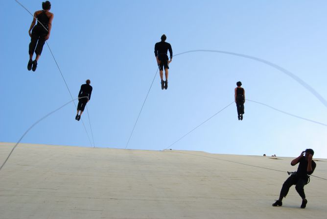 It takes effort to make vertical dance look effortless. The dancers use rock-climbing equipment and methods, as well as strong core muscles to defy gravity and keep their bodies perpendicular. 