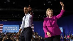 President Barack Obama and Democratic presidential candidate Hillary Clinton wave upon arriving at a campaign event at the Charlotte Convention Center in Charlotte, N.C., Tuesday, July 5, 2016. Obama is spending the afternoon campaigning for Clinton.