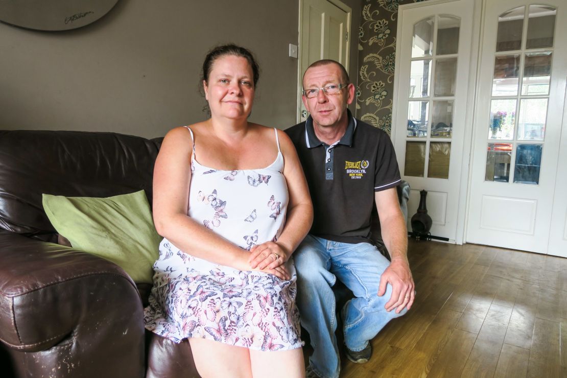 "We've been through worse storms than this," said Tony Bush, pictured with wife Emma Hamblett.