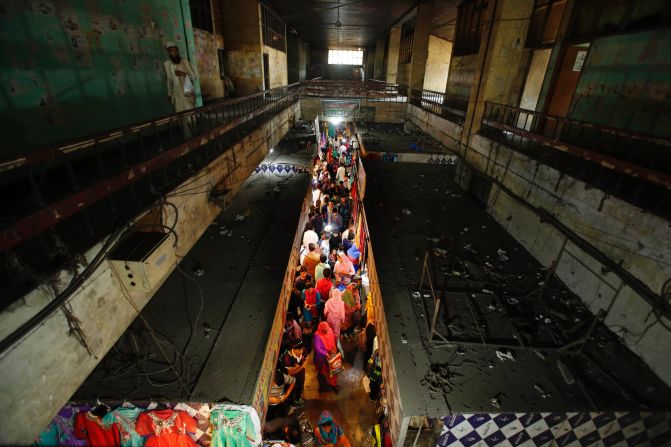 Kashmiri Muslims shop in Srinagar, India, ahead of Eid al-Fitr.