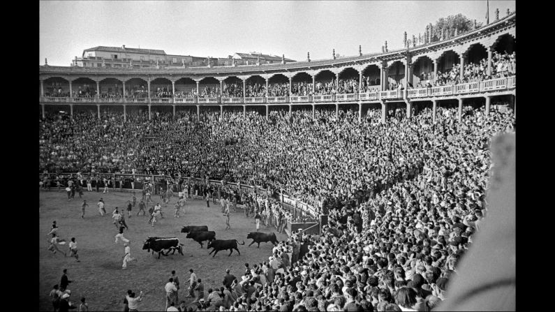 Bulls enter a bullring in Pamplona, Spain, during the San Fermin festival in 1954. The annual festival and its world-famous "Running of the Bulls," which started Thursday, have been around for centuries. Late photographer Inge Morath was in Pamplona more than 60 years ago to take these pictures.