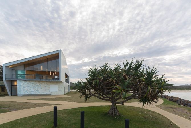 "A beachy, sparkly skin in soft pipi shell pastels wraps the building. Materials selection was critical due to its location 40 meters from breaking surf. The external walls are glazed brick and the membrane roof is clad in matching floor tiles. Internally the palette is deliberately raw -- concrete, concrete block, plywood, terrazzo," says Jones. 