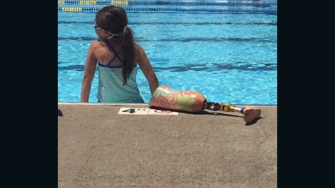 Katie loves to swim. She's recently gotten good at diving.
