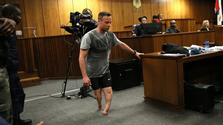 Paralympic athlete Oscar Pistorius walks in the courtroom without his prosthetic legs during his resentencing hearing for the 2013 murder of his girlfriend Reeva Steenkamp at the Pretoria High Court on June 15, 2016.
A sobbing Oscar Pistorius walked hesitantly on his stumps around court on June 15 in a dramatic demonstration of his disability ahead of his sentencing for murdering his girlfriend Reeva Steenkamp. / AFP / POOL / Alon Skuy        (Photo credit should read ALON SKUY/AFP/Getty Images)