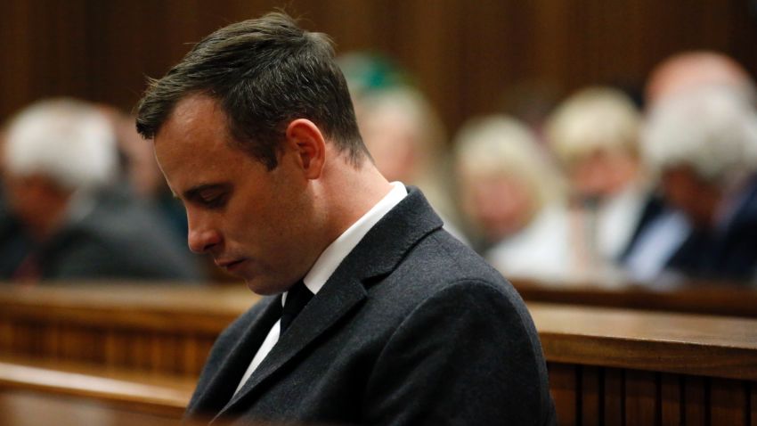 PRETORIA, SOUTH AFRICA - JULY 6: Paralympian athlete Oscar Pistorius (L), accused of the murder of his girlfriend Reeva Steenkamp three years ago, looks on during a hearing in his murder trial on July 6, 2016 at the High Court in Pretoria, South Africa.
 (Photo by Marco Longari - Pool/Getty Images)