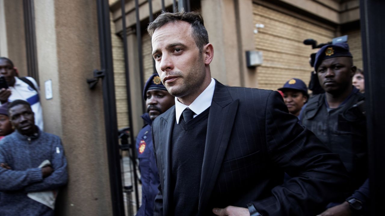 South African Paralympian Oscar Pistorius leaves the Pretoria High Court on June 15, 2016, after the third day of his resentencing hearing for the 2013 murder of his girlfriend Reeva Steenkamp.