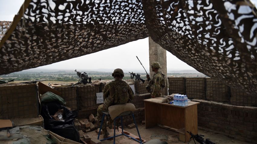 In this photograph taken on August 12, 2015, US army personnel keep watch at coalition force Forward Operating Base (FOB) Connelly in the Khogyani district in the eastern province of Nangarhar. From his watchtower in insurgency-wracked eastern Afghanistan, US army Specialist Josh Whitten doesn't have much to say about his Afghan colleagues. "They don't come up here anymore, because they used to mess around with our stuff. "Welcome to Forward Operating Base Connelly, where US troops are providing training and tactical advice to the 201st Afghan army corps as they take on the Taliban on the battlefield.