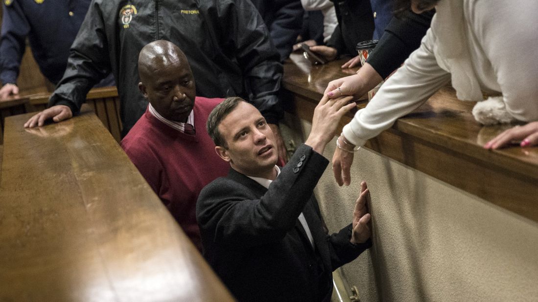 South African sprinter Oscar Pistorius shakes hands as he leaves a courtroom in Pretoria, South Africa, on Wednesday, July 6. Pistorius, the first double-amputee runner to compete in the Olympics, <a href="http://www.cnn.com/2016/07/06/africa/oscar-pistorius-sentence/index.html" target="_blank">was sentenced to six years in prison</a> after he was found guilty of murdering his girlfriend, model Reeva Steenkamp, in February 2013.