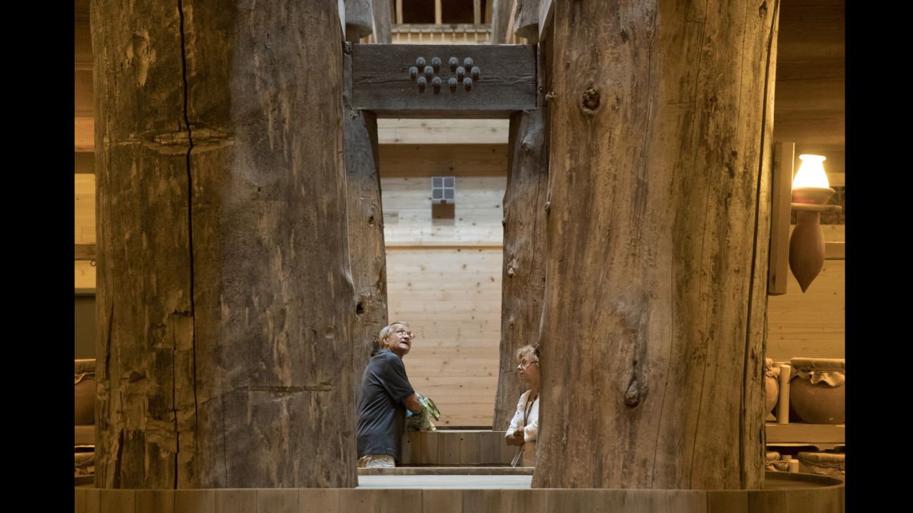 People tour the interior of the ark.