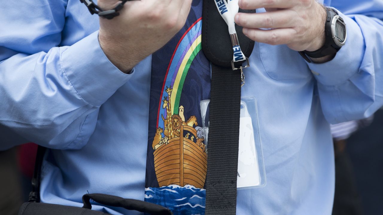 A man wears a Noah's Ark-themed tie at the ribbon-cutting ceremony.