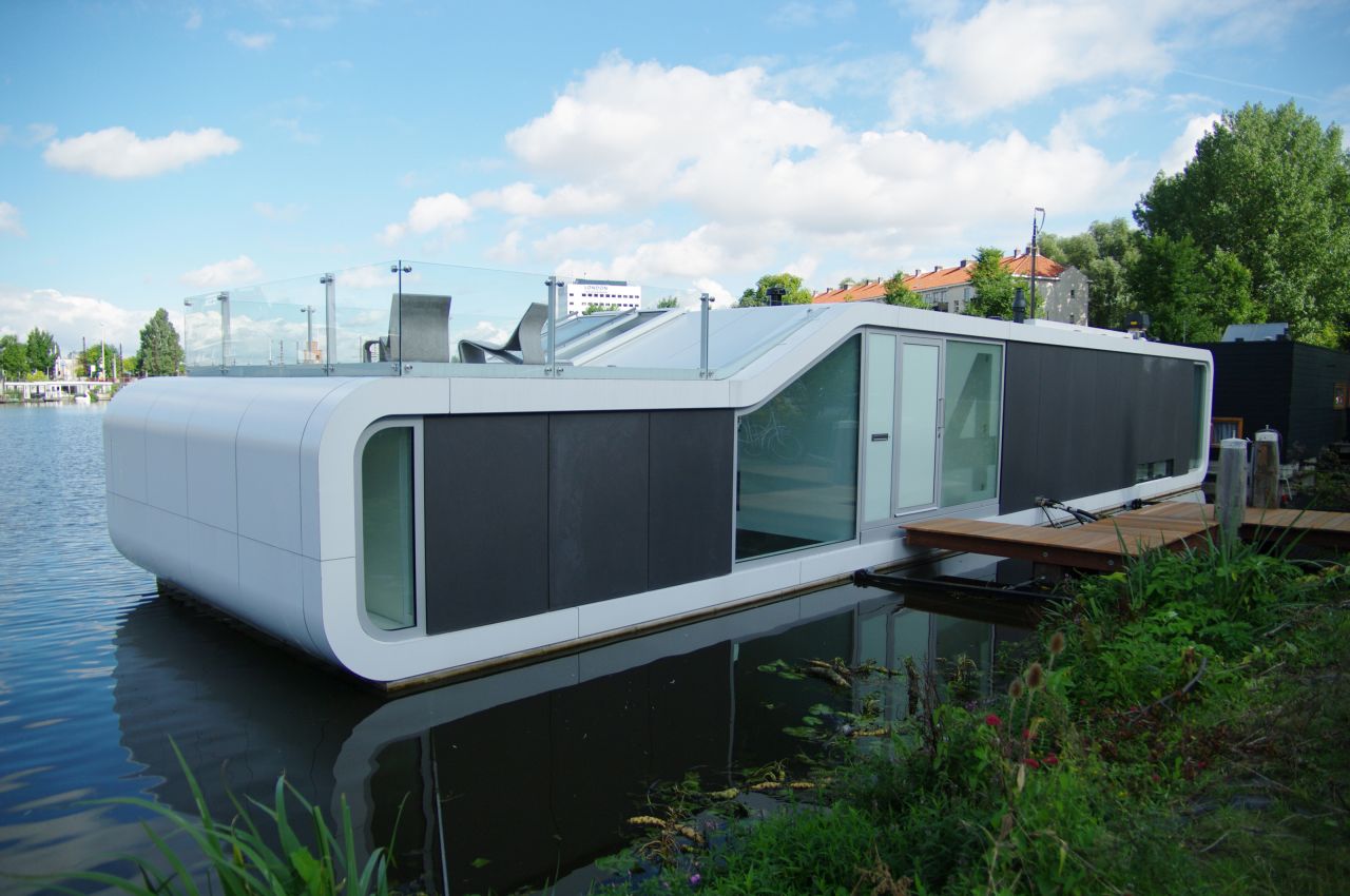 House boats are nothing new in the Netherlands, where much of the land lies beneath sea level and is susceptible to flooding. Designed and constructed by +31ARCHITECTS, the 2,120-square-foot Watervilla de Omval floats on the Amstel River. It's a contemporary take on the traditional houseboat, featuring a curvaceous exterior, glass-front façade and a rooftop terrace to make the most of the surrounds.