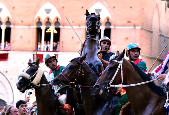 The Palio di Siena horse race takes place twice a year, in July and August, in the central piazza of the Italian city.