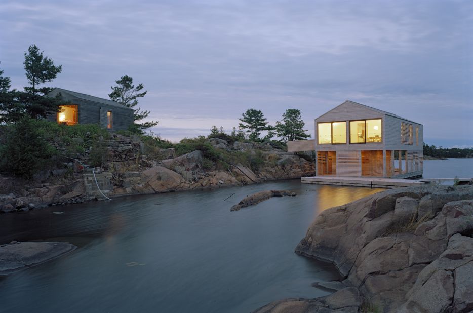 Tucked away in the Great Lakes, MOS Architects' one-bedroom Floating House rests atop steel pontoons, allowing it to rise and fall with water levels. Built off site, the house traveled about 50 miles before reaching its home on the remote island in Lake Huron.