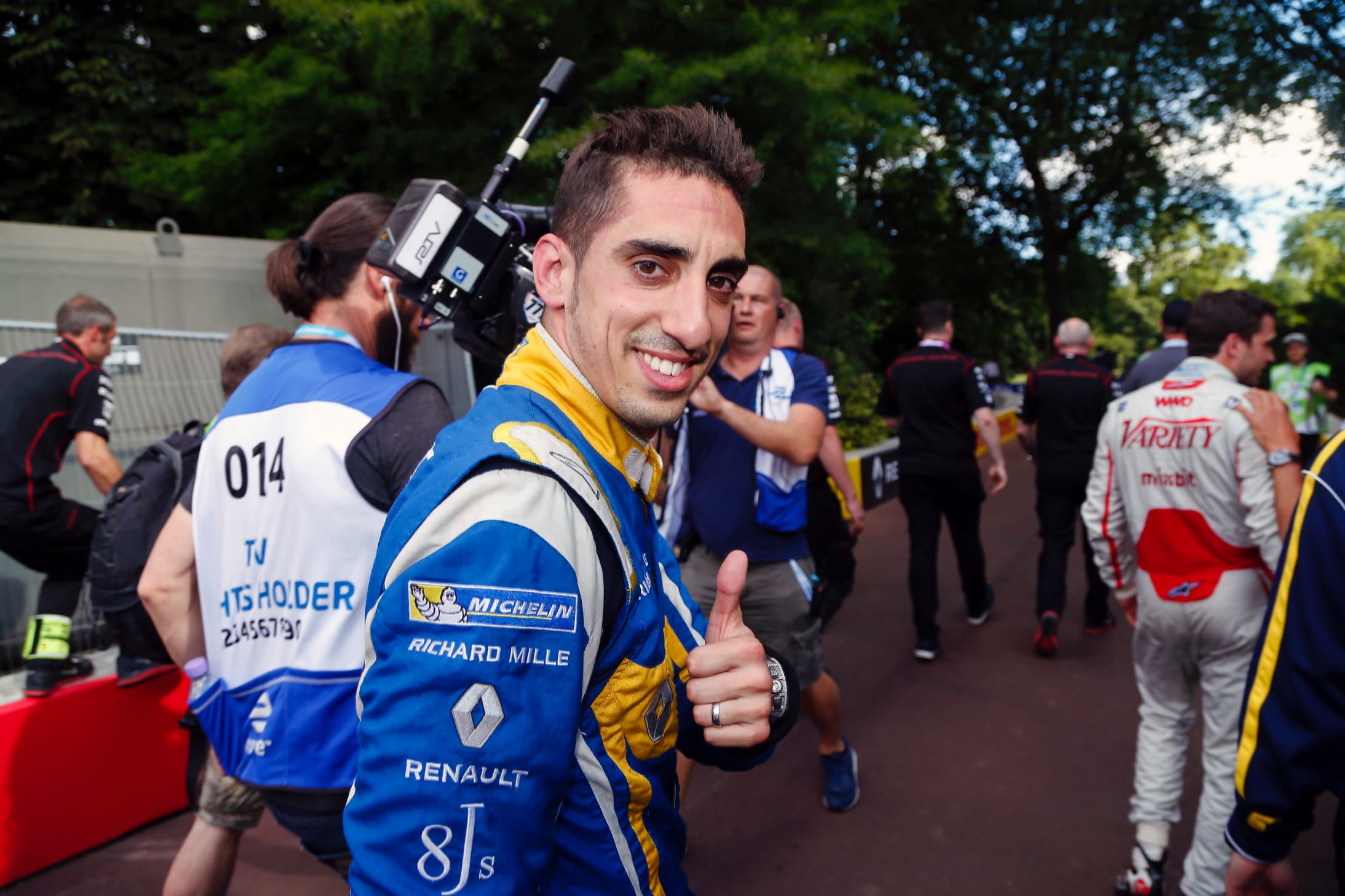 Buemi gives a thumbs up after clinching the world title in London. The Swiss had been trailing di Grassi coming into the final two rounds of the season but sealed the title by recording the fastest lap in the last race picking up the two points he needed to win.