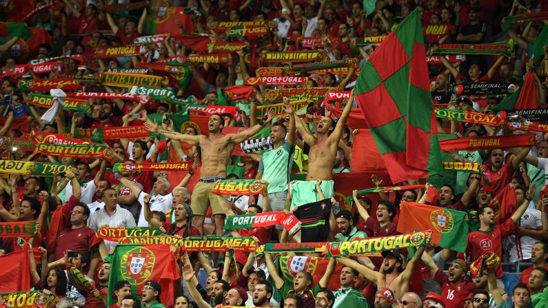 Portugal's supporters cheer their team after the second goal.
