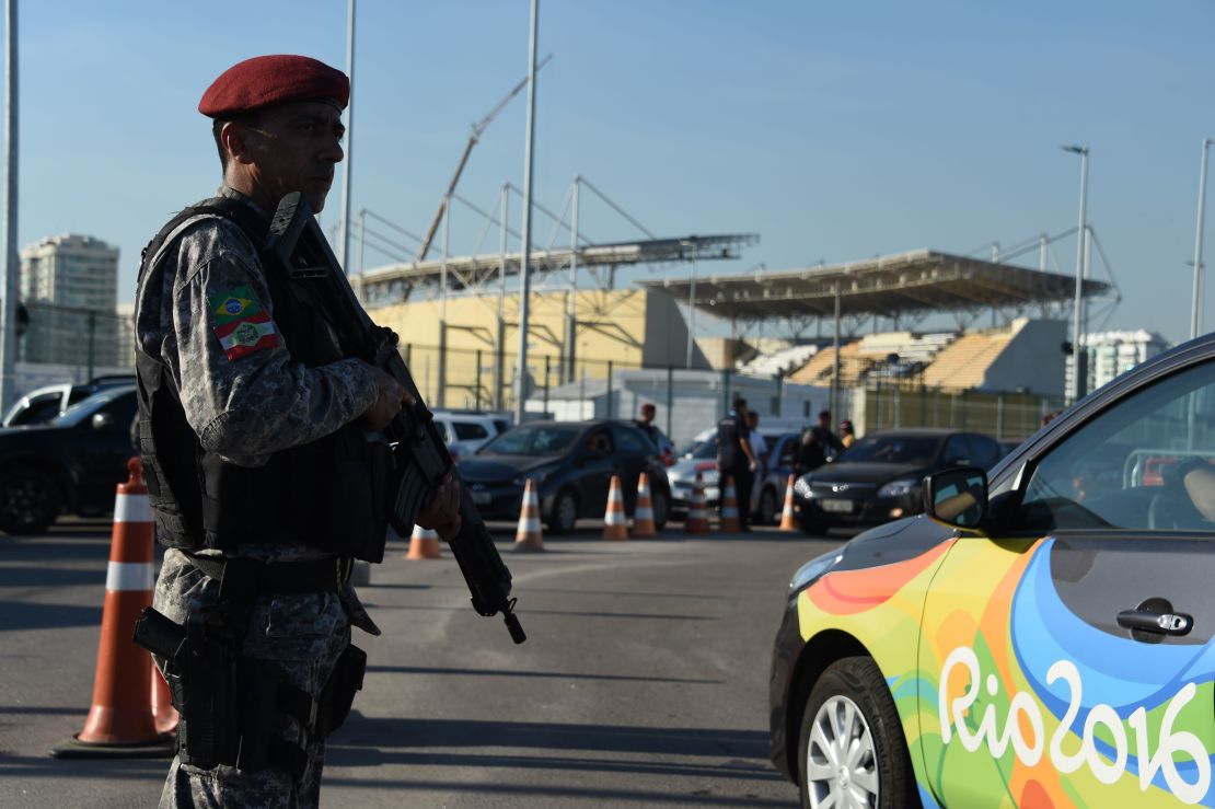 Security is visible at a checkpoint Tuesday at the Olympic Village in Rio de Janeiro. 